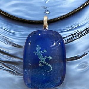 Artisan hand crafted unisex dichroic fused glass lizard pendant on black leather